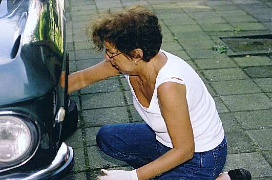 Undoing left front shock absorber